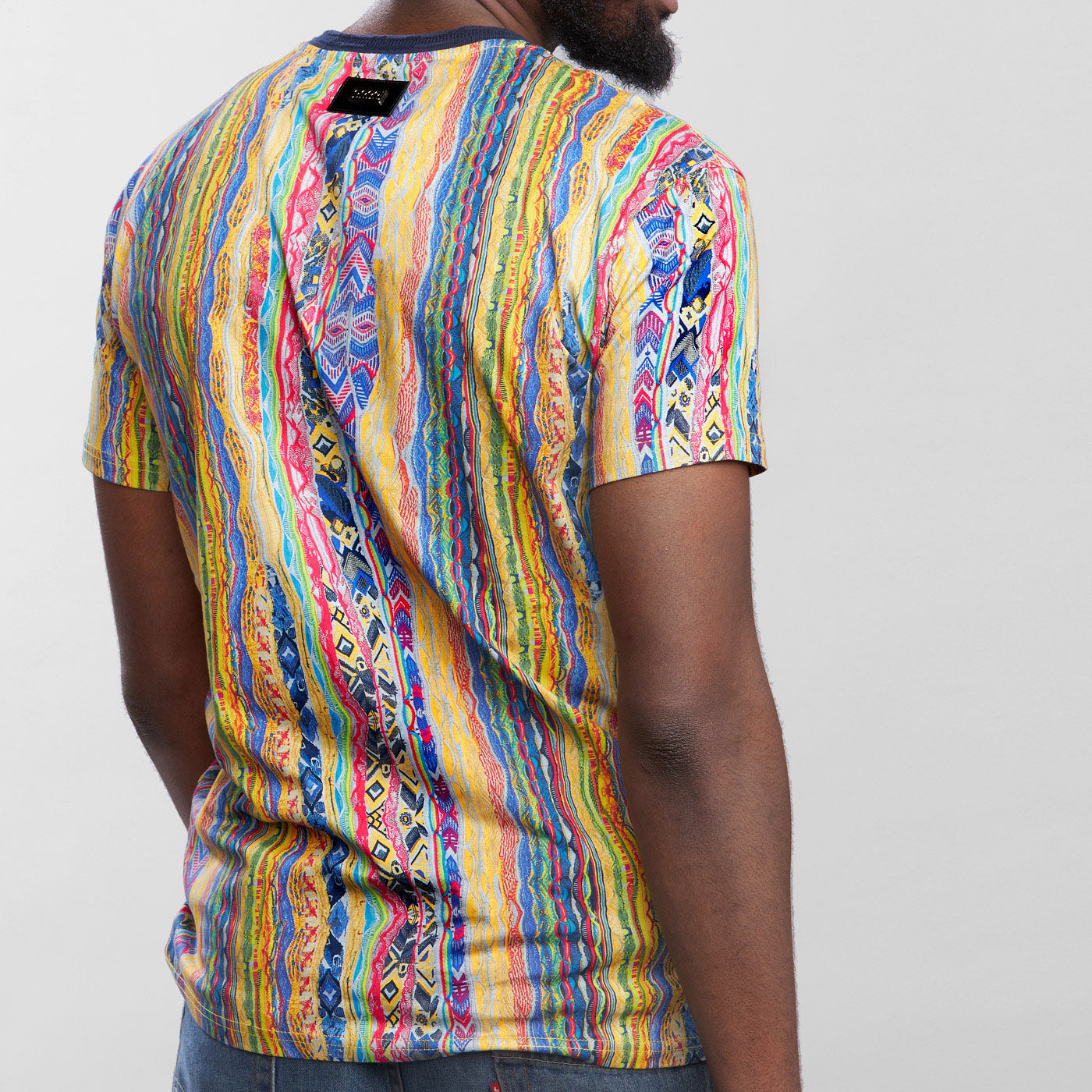 COOGI TRIBUTE ALL-OVER V-NECK TEE